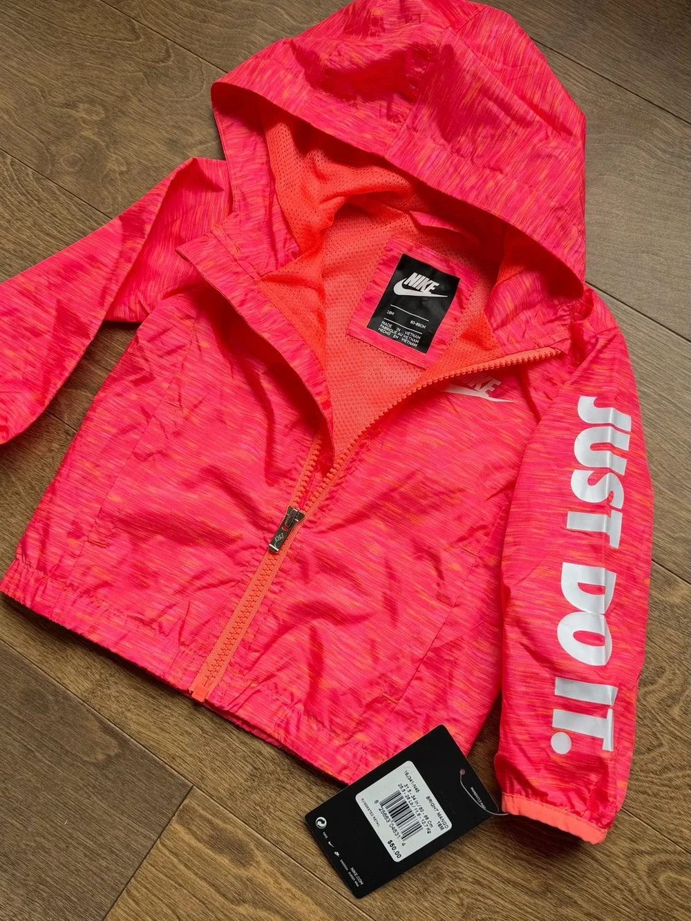 Nike toddler windbreaker in bright mango. 18 month. NWT